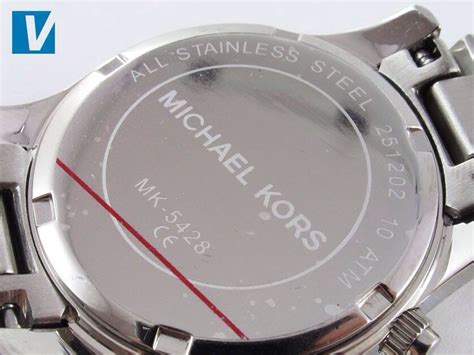 how to find a fake michael kors watch|michael kors watch lookup.